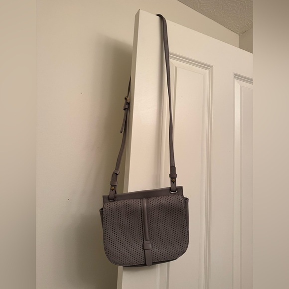 Fossil Handbags - Fossil Taupe Crossbody Bag with Perforated Design
Cow Hide Leather